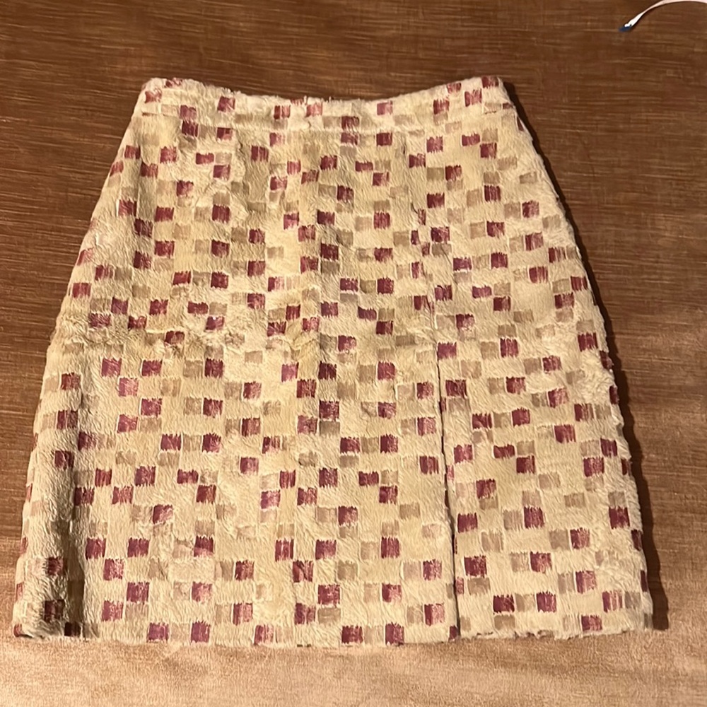 Philippe Adec zippered short skirt with slit in the front. Tan,burgundy velvet.